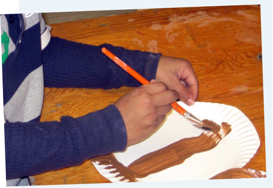 child painting paper plate