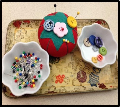 buttons, pin cushion and pins fine motor tray