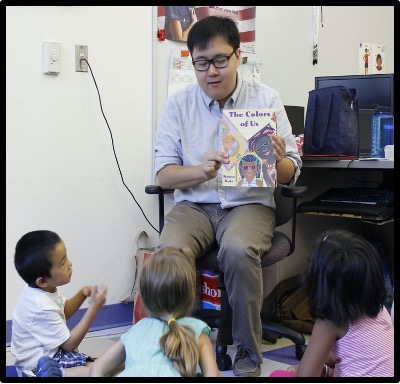 teacher reading to students