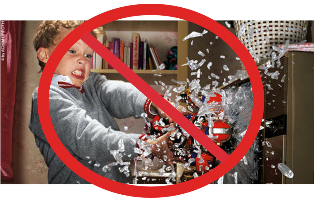 Boy breaking glass with a red circle with a line through it.