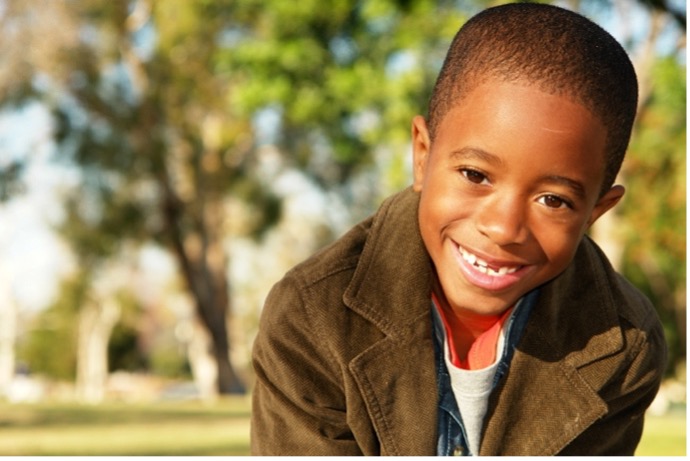 A boy smiling.