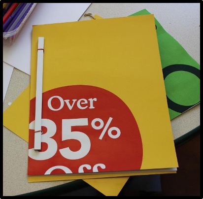 Note book cover that says 35 percent off