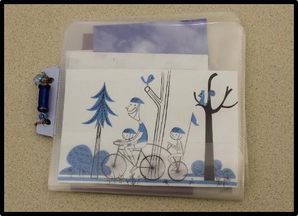 CD sleeve illustration of family on a bike ride