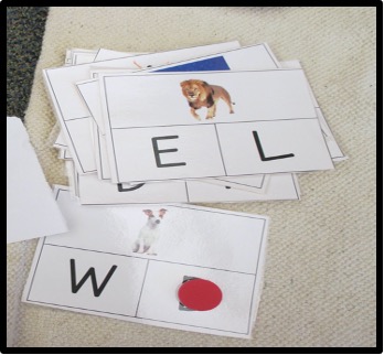 letter sound matching game. Child uses  a clothespin to indicate the corresponding sound on a card