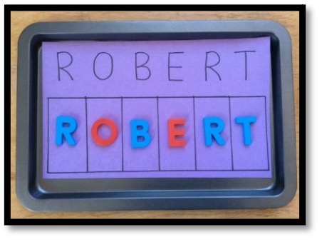 Name grid with magnetic letters