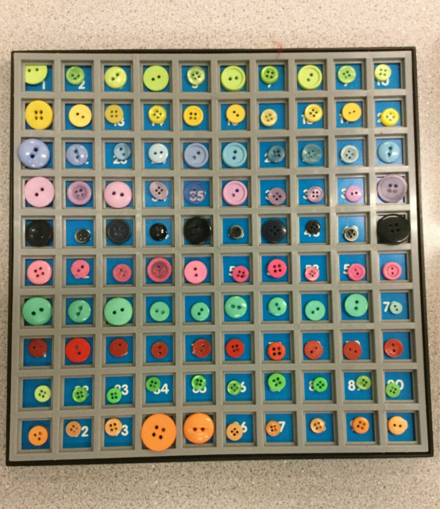 organized collection of various colored buttons