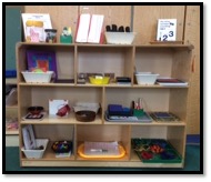 Preschool math shelf with individual math kits and trays