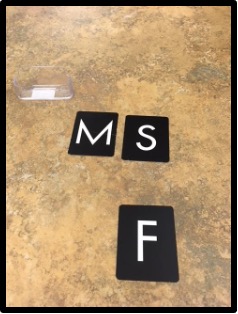 Sandpaper letters "M" "S" and "F"