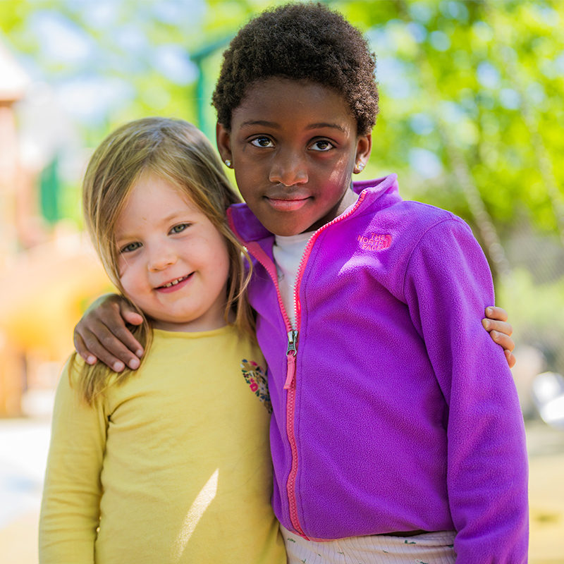 two children hugging